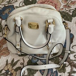 White Michael Kors purse.